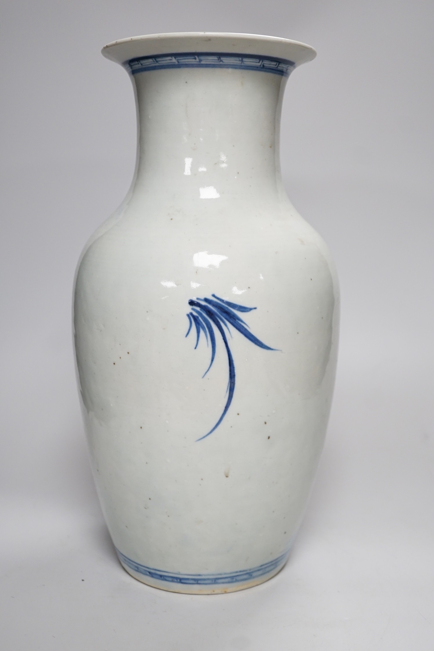 A large Chinese blue and white vase, blossoms, peaches and birds, 37cm